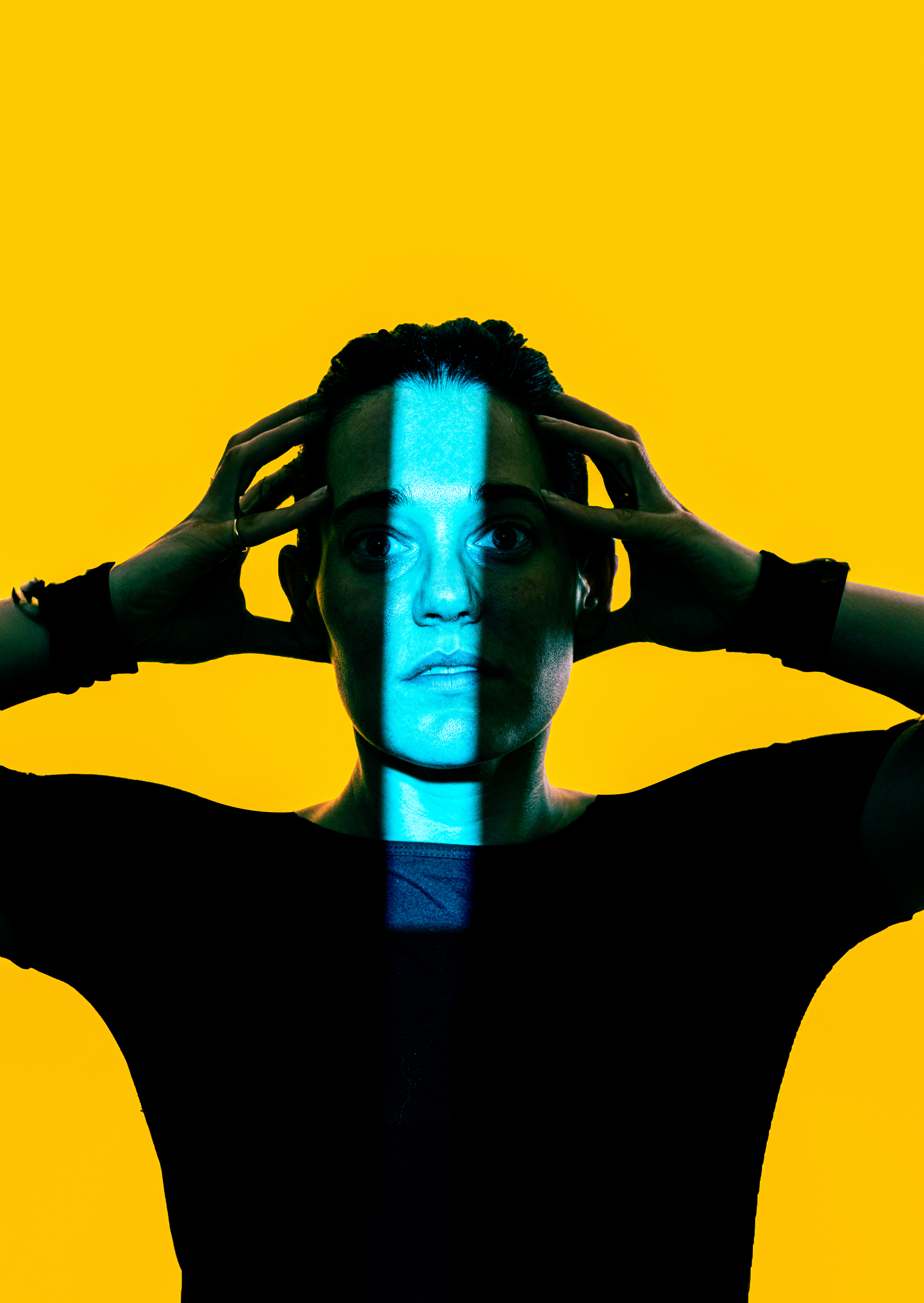 Portrait of a woman on a yellow background