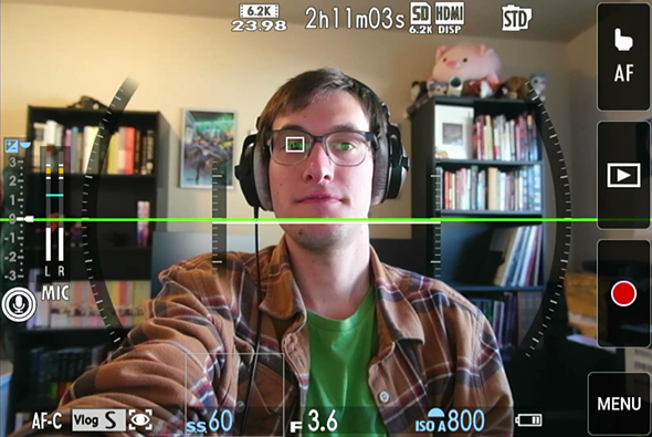 Screenshot of the X-M5's vlogging mode, showing the record, playback, and menu button