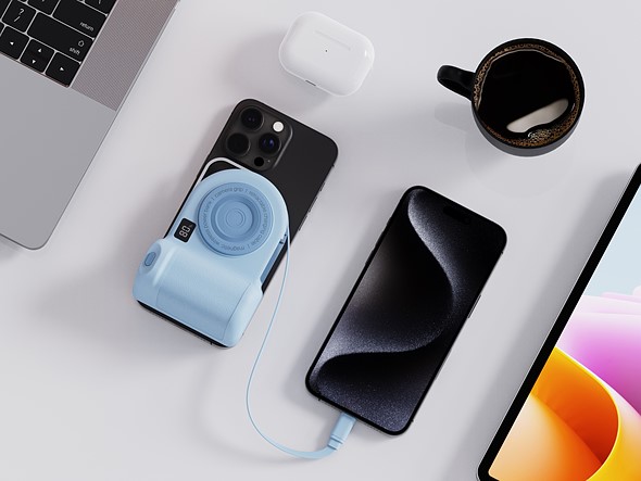 Belkin Stage Powergrip attached to phone charging with retractable cable