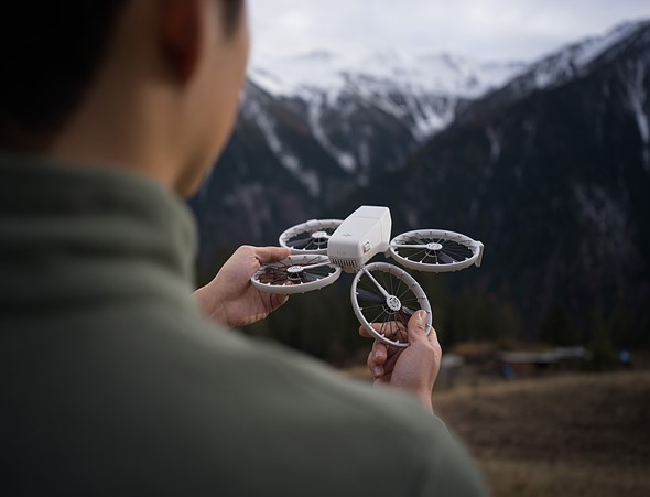 dji-flip-foldable-drone-in-hand