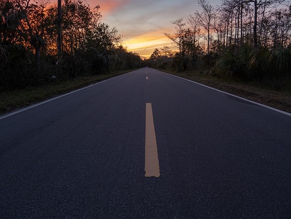 Sunset on a remote highway in Everglades National Park