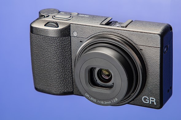 Ricoh GR III on blue background