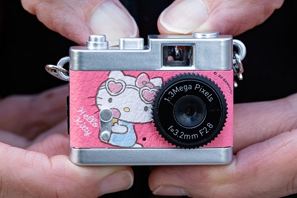 Hello-Kitty-camera-in-hands