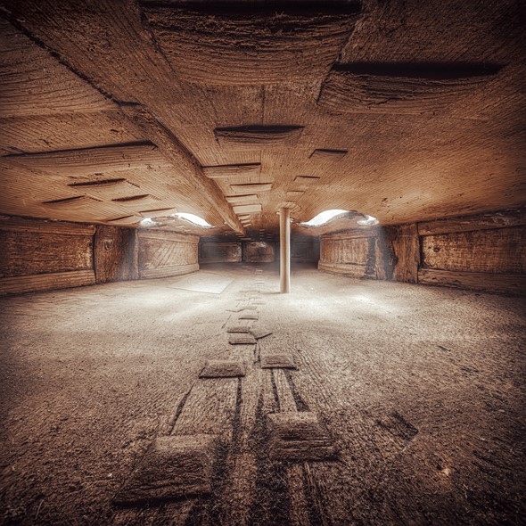interior of violin with wood post