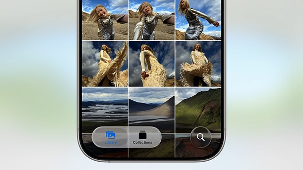 half an iphone with gallery app up is placed on blue green faded background