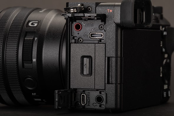 the sony a6700 dsits with port doors open revealing ports