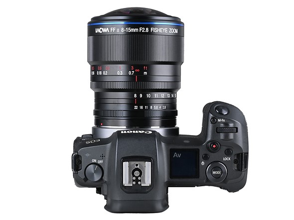 top view of canon camera with laowa fisheye lens against white background