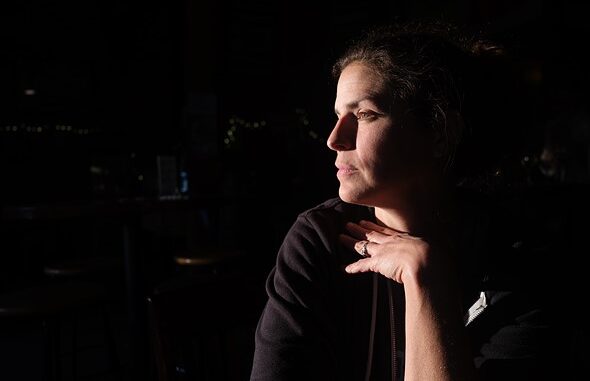 woman_highlighted_staring_into_distance