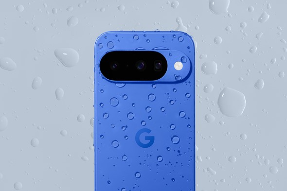 a blue phone is on a gray background with both covered in water drops
