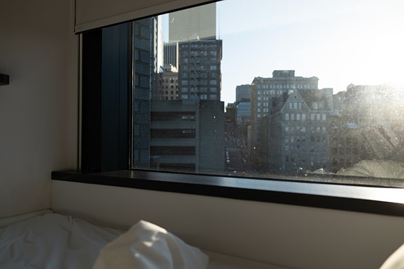a cityscape extends beyond a large window