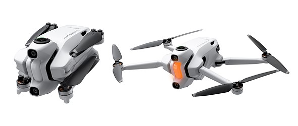 a folded white drone and unfolded white drone are on a white background