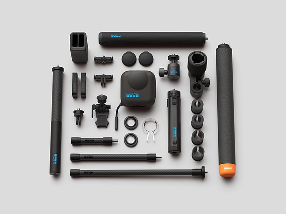 the gopro max2 is on a white table surrounded by accessories