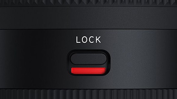 a closeup of a zoom lock on a black lens