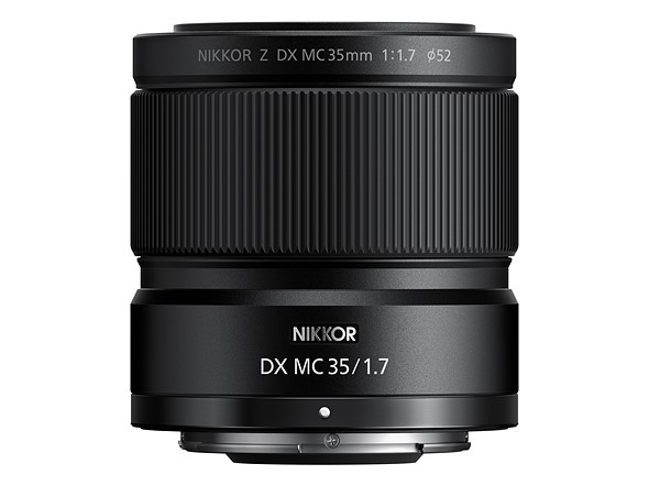 a nikon 35mm macros lens stands on a white background