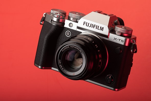fujifilm x-t5 floating against red background