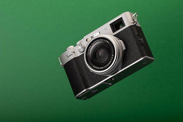 fujifilm x100 vi floating on green background
