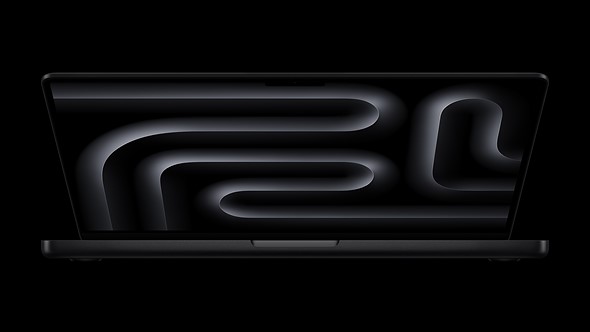 the_Apple-MacBook-Pro-14-is_cracked_open_on_a_black_background
