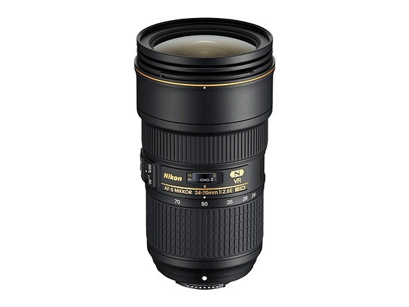 the nikon 24 70 f mount lens stands on a white background