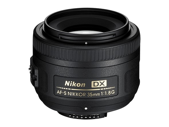 the nikon 35mm f mount lens is on a white background