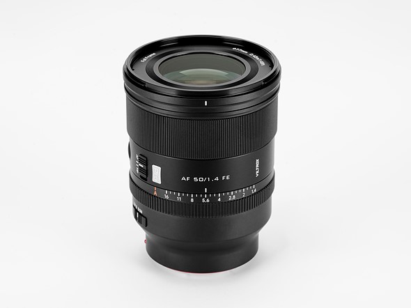 the viltrox 50mm f1p4 lens stands on a white background