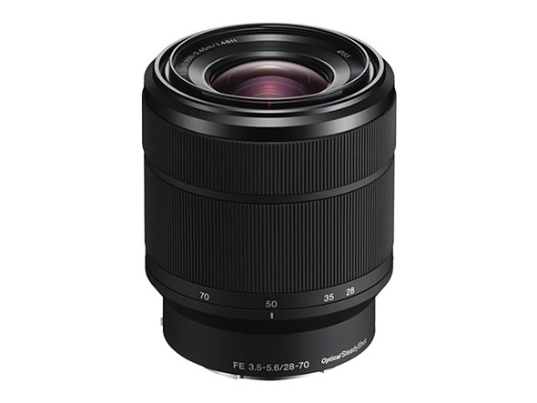 a sony 28-70mm lens stands on a white background