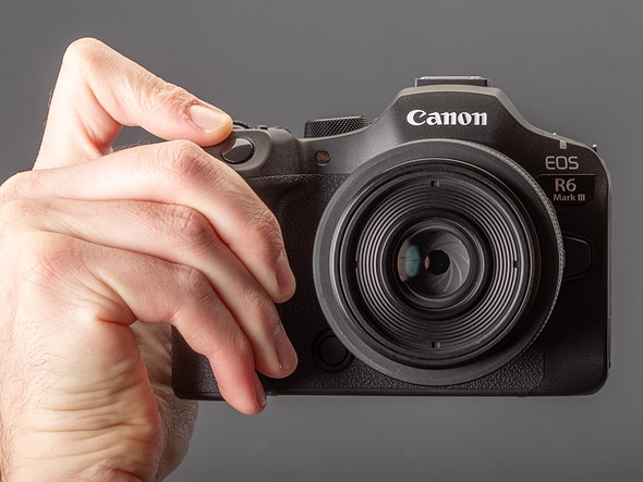 canon eosr6iii in hand from front