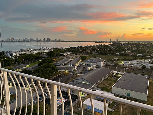 pedrin-sunset-city-skyline-balcony-view