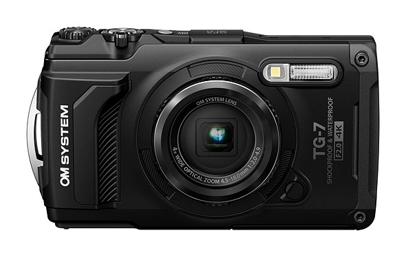 a black om system tough compact camera is on a white background