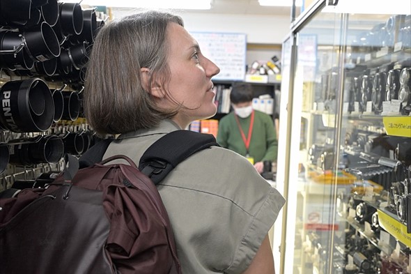 abby in used film camera store