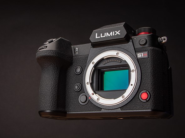 the panasonic s1h floats above a black background