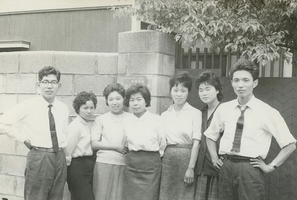 black and white photo of sigma founder michihiro yamaki and other early supporting members of the sigma research institute