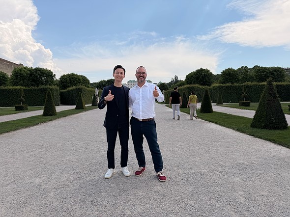 TJ Watson of Xiaomi and Pablo Acevedo Noda of Leica hos for a photo under blue skies