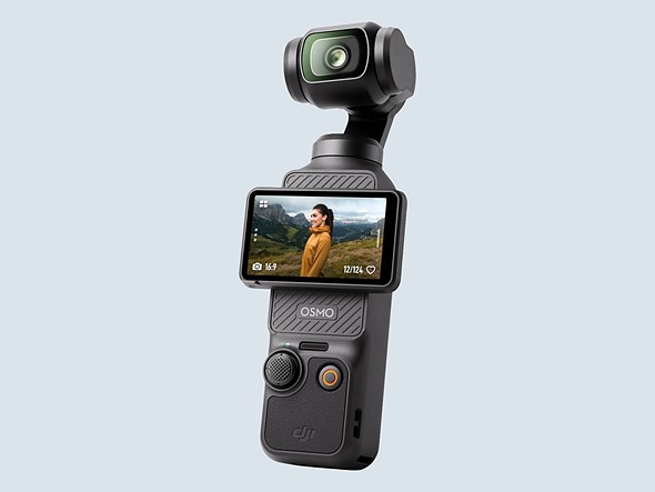 a dji camera gimbal on a pale blue background