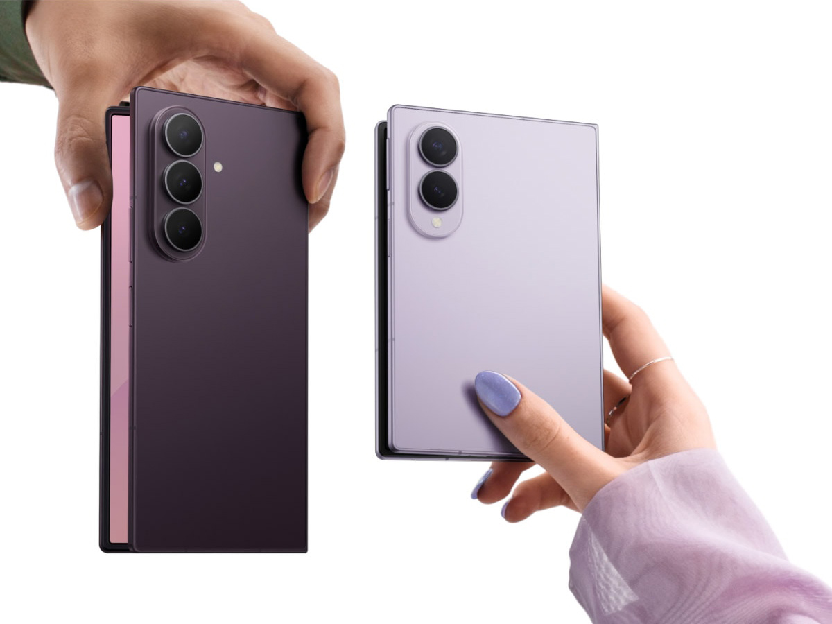 Two hands holding two folding phones. On the left is a tall, thin one, and on the right is a wider, shorter one.