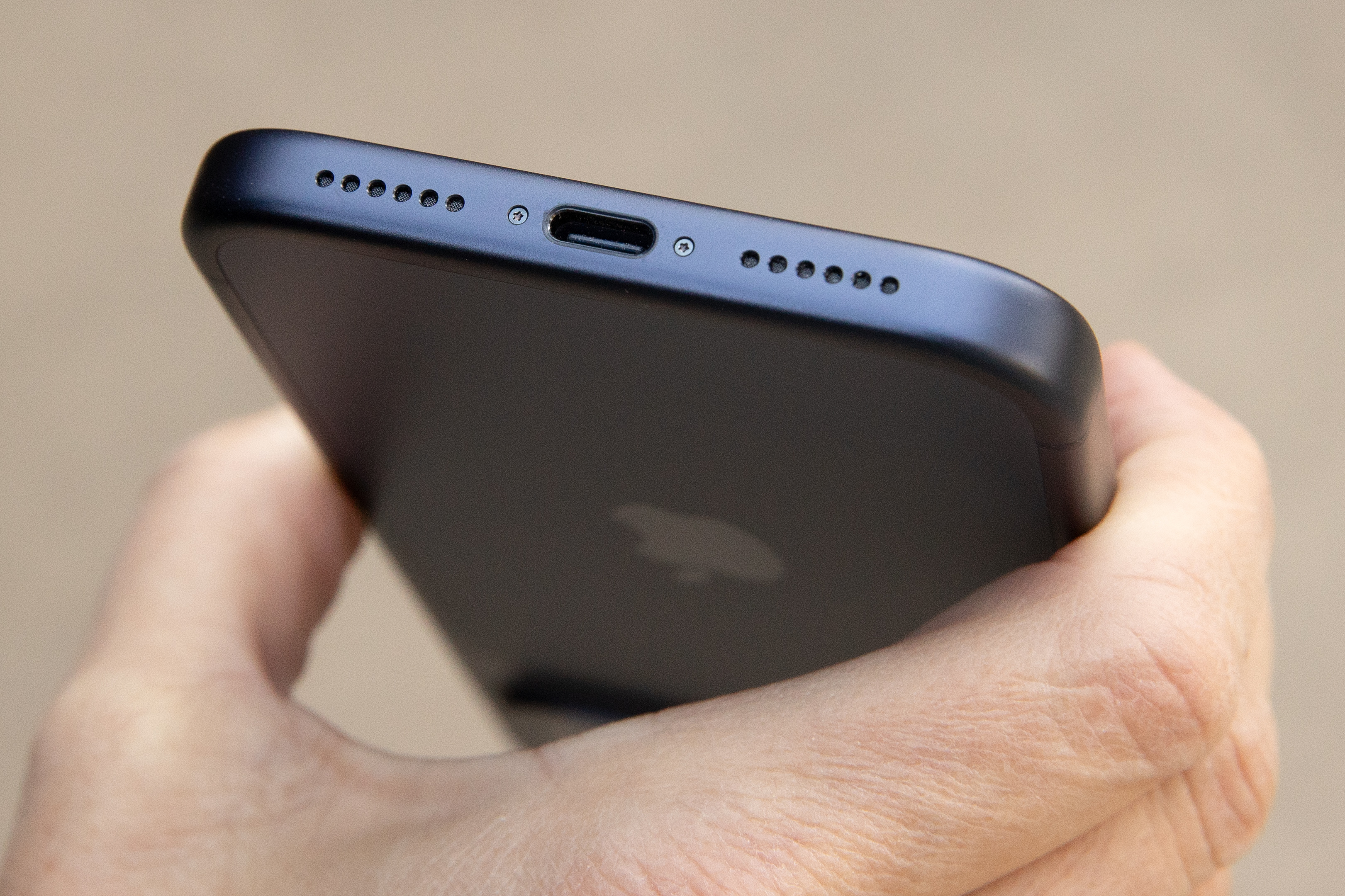A closeup of the USB-C port on a blue iPhone 17 Pro Max