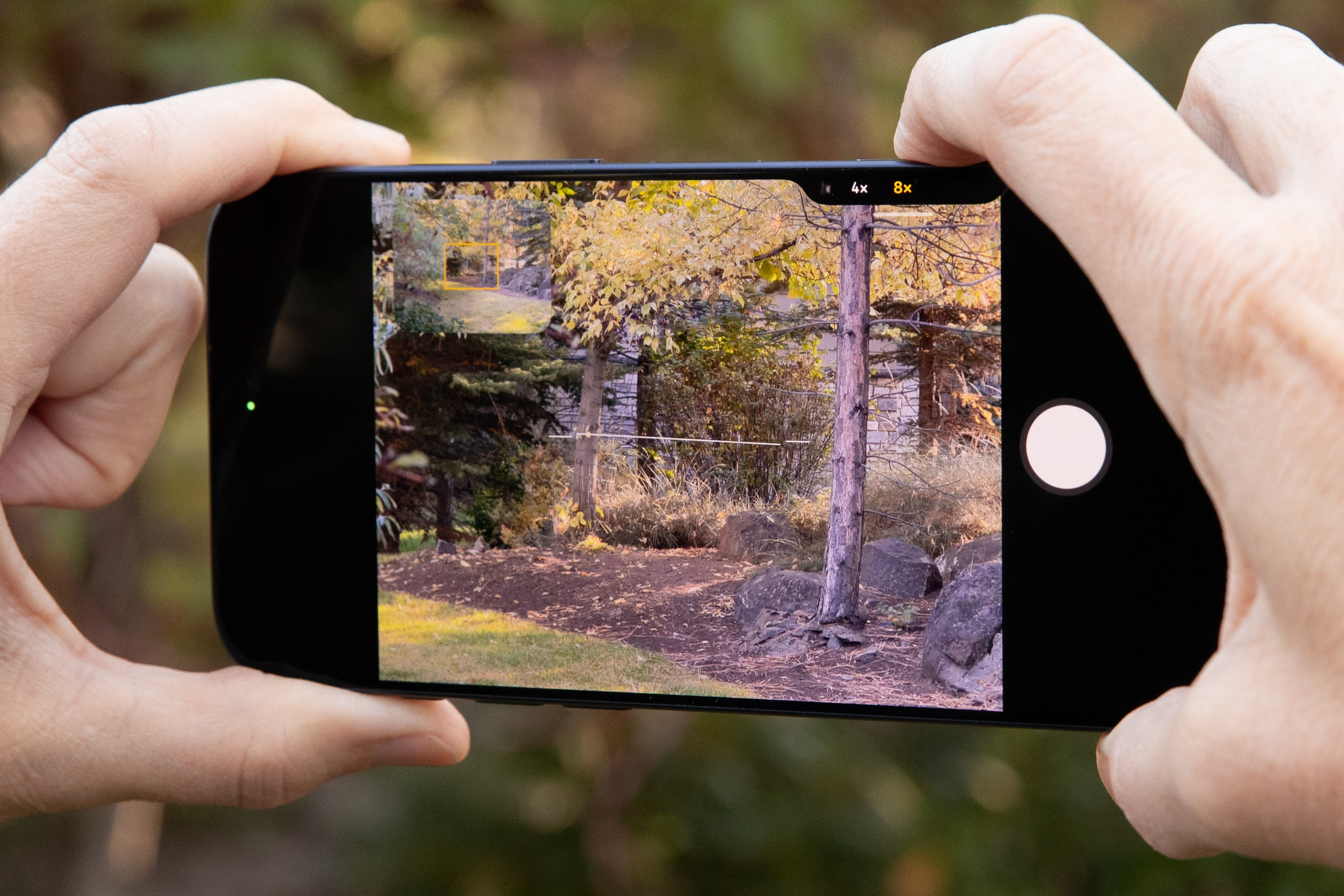 A closeup of the iPhone 17 Pro Max with the camera app open to show the Camera Button in action