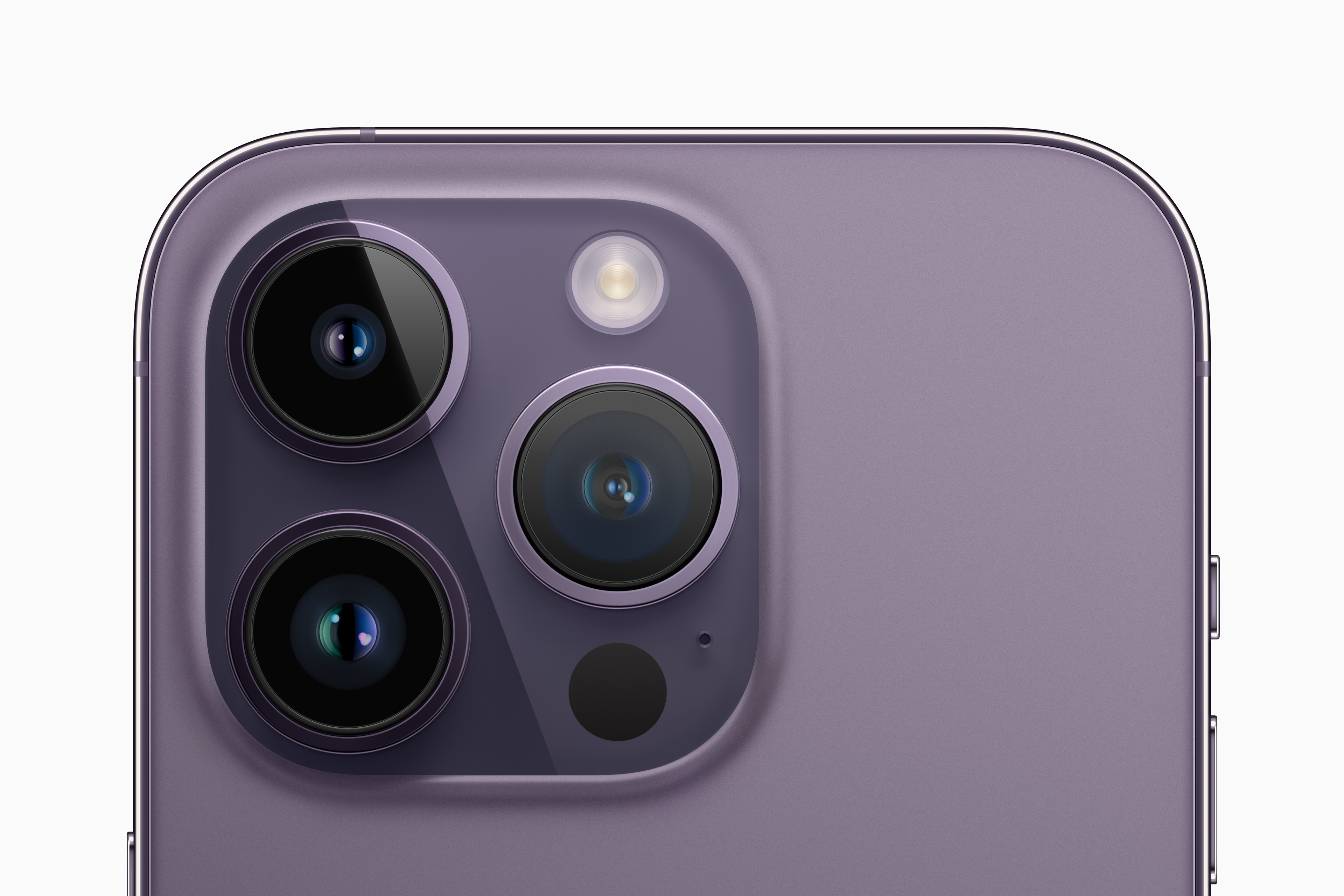 an Apple marketing image showing the back of a lavender colored iPhone 14 Pro and its triple camera array