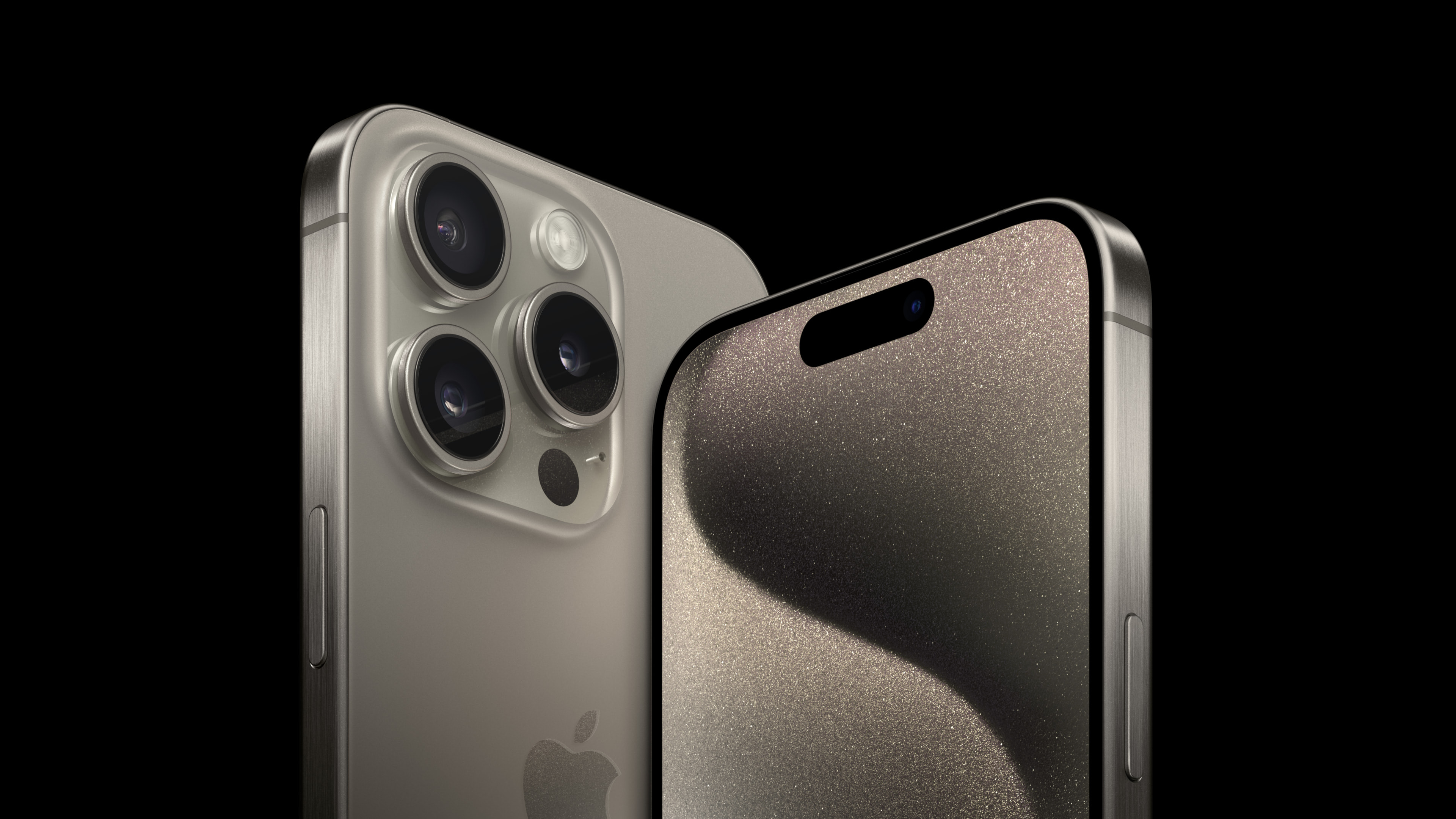 an Apple marketing image showing the front and back of the iPhone 15 Pro in gold color
